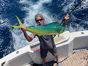Happy customer caught thsi beautifil mahi on a full day near shore charter trip.