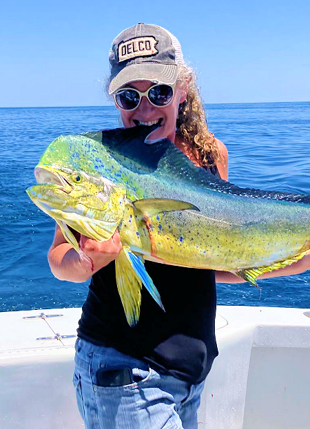 Lady angler showing her big mahi.